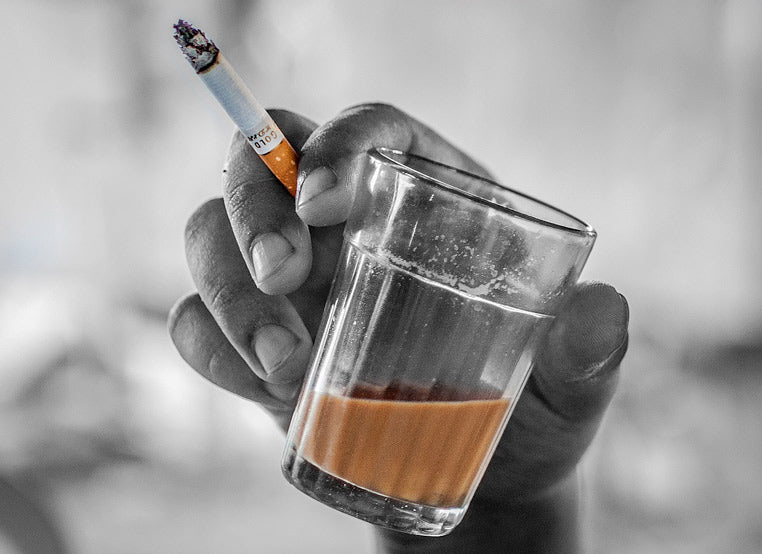 Drinking tea and smoking cigarettes at same time 