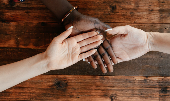 Hands on hands stock image