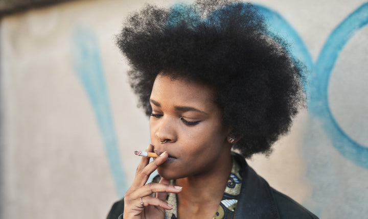 teenager smoking cigarette image