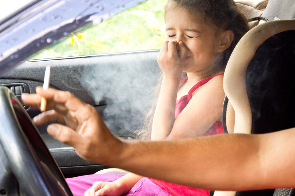 Smoking cigarettes in car 